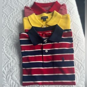 Three Ralph Lauren Polo Shirts that are short-sleeve and in good condition.